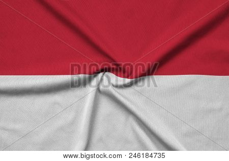 Indonesia Flag  Is Depicted On A Sports Cloth Fabric With Many Folds. Sport Team Waving Banner