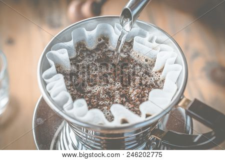 How To Dip Coffee By Yourself Concepts : Barista Pouring Hot Water On Ground Coffee With Filter To M