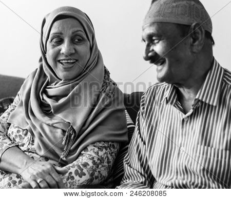Mature Muslim couple at home