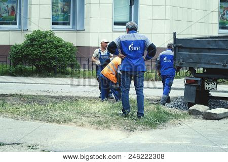 Road Works, Closing Holes In Asphalt And Workers June 2, 2018, Russia, Leningrad Region City Of Kiro