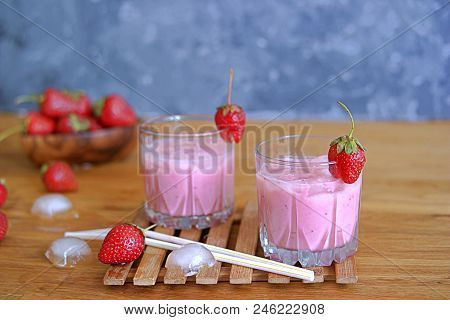 Strawberry Lassi, An Indian Traditional Drink Based On Yogurt. Served With Ice.