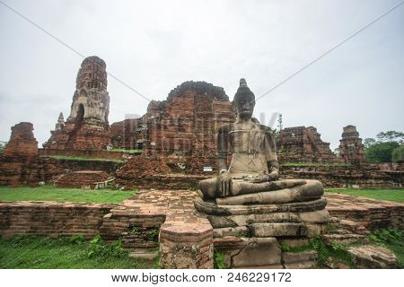 Buddha Statue In The Mid Of Temple Area, Ayutthaya, Thailand