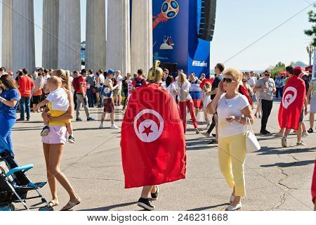 Football Fans Of The National Team Of Tunisia With National Flags And Attributes