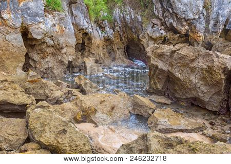 the famous beach gulpiyuri, in Asturias, Spain
