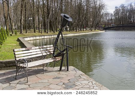 Smolensk, Russia - April 22, 2018: Funny Park Sculpture - A Lantern In The Form Of A Fisherman With 