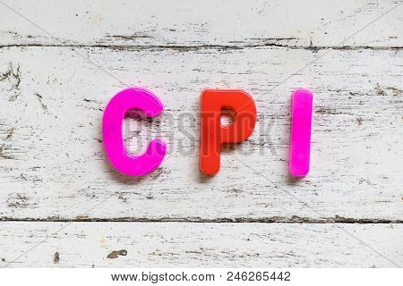 Color Alphabet In Word Cpi (abbbreviation Of Consumer Price Index) On Grunge Old White Wood Backgrou