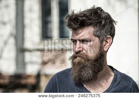 Sadness And Problems Concept. Man With Beard And Mustache Looks Not Fresh. Hipster With Beard Looks 