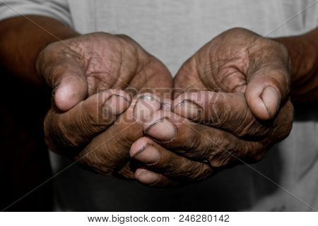 Hands Poor Poverty Elder Man Begging You For Help. Concept Hunger People Or Poverty. Selective Focus