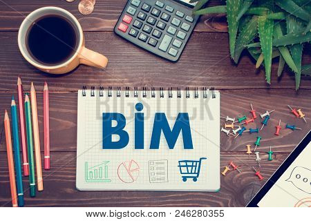 Notebook With A Notes Bim On The Office Table With Tools