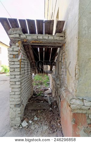 Residential Brick Three-storey House On Kerch Street 5. Photo On A Wide-angle Lens With Distortion. 