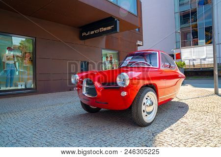 Tallinn, Estonia. June 10, 2018. Three Wheel Red Car Standing In Tallinn Rotermann District. Vintage