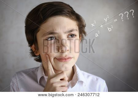 Teenager Clever Boy Thinking Difficult Equation Close Up Photo