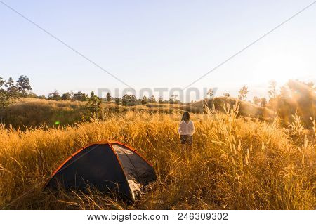 Outdoors Camping Grass Highlands Mountain In The Sunset.