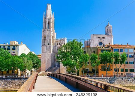 Colorful Red, Orange And Yellow Houses And Bridge Through River Onyar In Girona, Catalonia, Spain. S