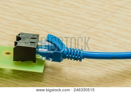 Closeup Of Blue Ethernet Cables Plugged In Homemade Ethernet Cable Connector
