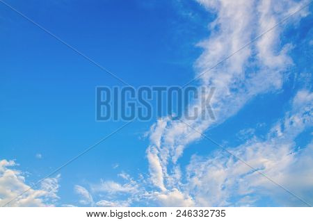 Blue Sky With White Clouds In Summer