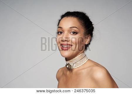 Beauty Closeup Profile Portrait Of Beautiful Mixed Race Woman Wearing Chocker Looking At Camera, Iso