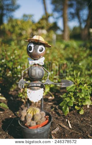 One Decorative Garden Funny Cute Sweet Ant In Hat, Bow Tie With Shovel In Flower Pot With Cactus Dec