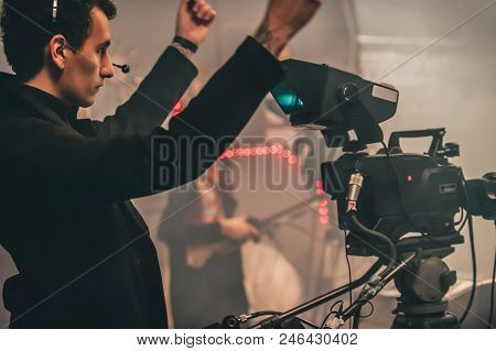 Behind The Scene. Multiple Camera Setup. Cameraman Shooting The Film Scene With Camera In Film Studi