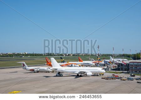 Berlin Germany - April 21. 2018: Airplanes At The Terminal At Berlin Tegel Airport