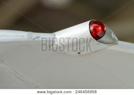 Wing Of An Airplane With Position Lighting, Detailed Close Up Photo