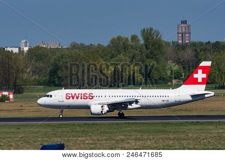 Berlin Germany - April 21. 2018: Swiss Airbus A320 Landing At Berlin Tegel Airport