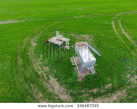 A Tank With Methanol Near The Oil Well. Equipment Of An Oil Well. Shutoff Valves And Service Equipme