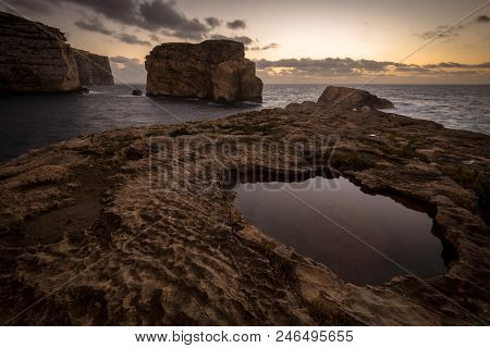 Fungus Rock In The Dwejra Bay, Malta Gozo