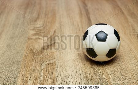 Soccer Ball On The Wooden Floor