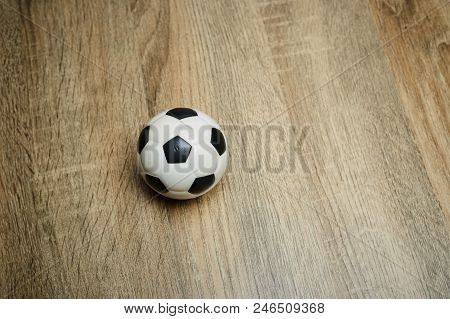 Soccer Ball On The Wooden Floor