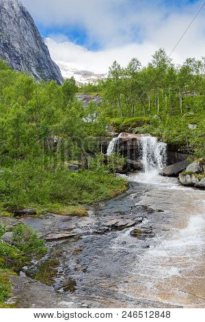 Torrent Plunges From The Mountains On Lofoten, Nordland, Norway