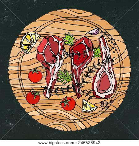 Lamb Ribs Chops With Herbs, Lemon, Tomato, Parsley, Thyme, Pepper. On A Round Wooden Cutting Board. 