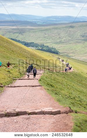 Brecon Beacons, Wales - May 05, 2017: People In Distance Walking On The Footpath That Leads To Pan Y