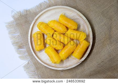 Close Up Of Thai Traditional Dessert, Rolled Egg Yolk Thread. Thai Style Fios De Ovos.