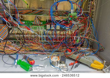 The Wires Connected To The Device Inside The Untidy Cable Electrical Cabinet