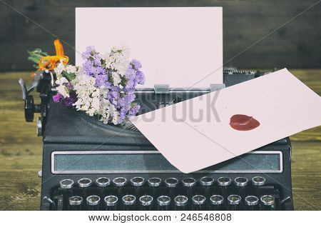 Old Typewriter With Paper And In Envelope