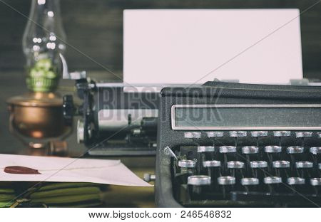 Old Typewriter With Paper And A Envelope
