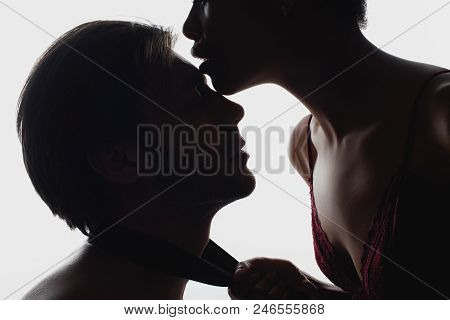 Partial View Of Silhouettes Of Sexy Couple With Cloth