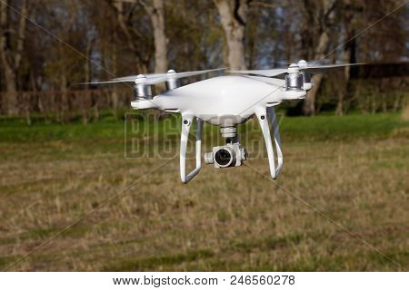 Tullgarn, Sweden - May 6, 2018: One White Dji Phantom 4 Quadcopter With Its Camera Pointing Forward 