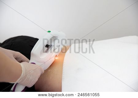 Man Receiving Laser Epilation At Armpit On Beauty Center