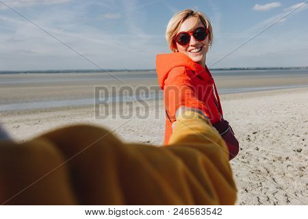 Friends Holding Hands Sandy Beach, Saint Michaels Mount, Normandy, France