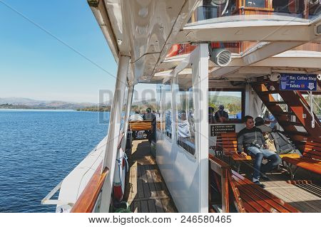 South Lakeland, Uk - April 2018: Tourists Enjoying Boat Cruise At Lake Windermere From Bowness-on-wi