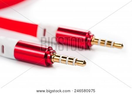 .a Cord With A 3.5Mm Bright Red Connector On A White Background
