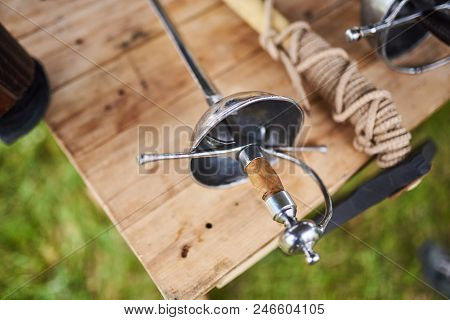 Medieval Weapons On A Wooden Table For Any Purpose
