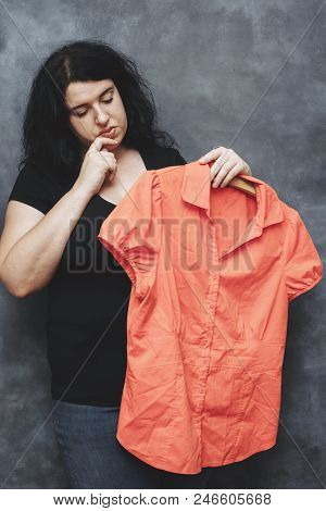 Inconvenience, Overweight, Shy, Body Shaming, Weight Loss, Hiding Problems. Overweight Woman Hesitat