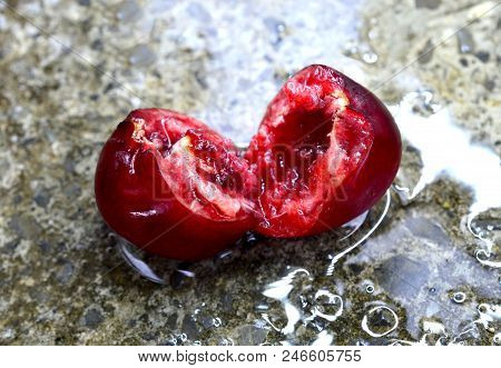 Red Ripe Raw Cherry And Pits