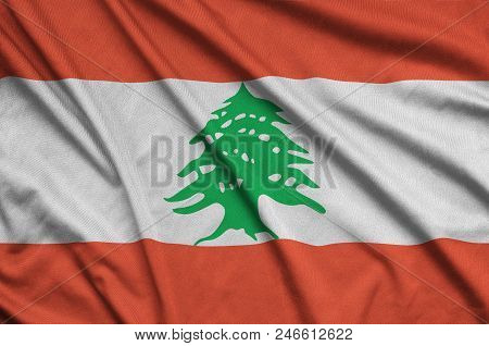Lebanon Flag  Is Depicted On A Sports Cloth Fabric With Many Folds. Sport Team Waving Banner