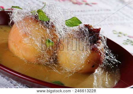 Baked Apple In Sirup With Sugar Floss