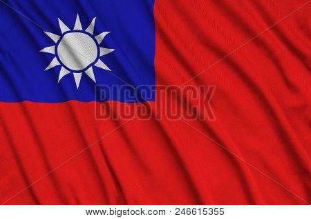 Taiwan Flag  Is Depicted On A Sports Cloth Fabric With Many Folds. Sport Team Waving Banner
