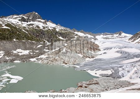 Rhone glacier, source of Rhone river, melting and retreating due to global warming. Rhone glacier is loosing up to 2 meters in length every year.
